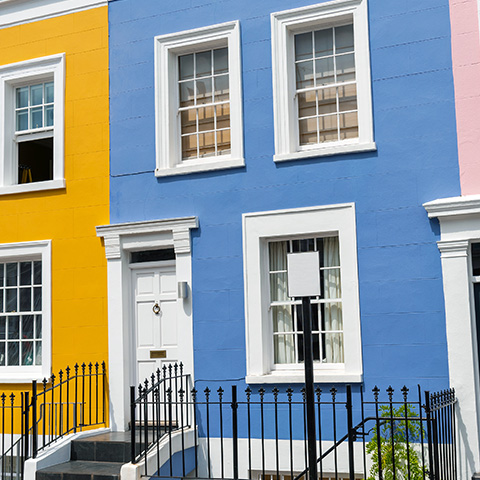 logo of SPS Surveys featuring architectural elements and checkmarks representing reliable inspection services